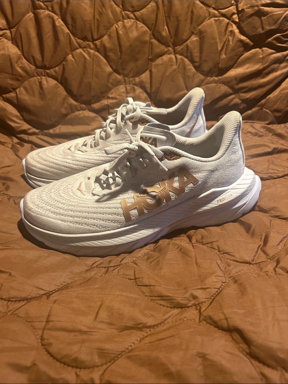 HOKA Women's White Running Shoes with Gold Logo